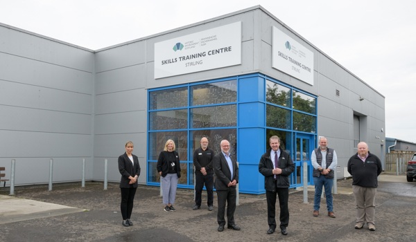 A group of people standing outside the Stirling Skills centre